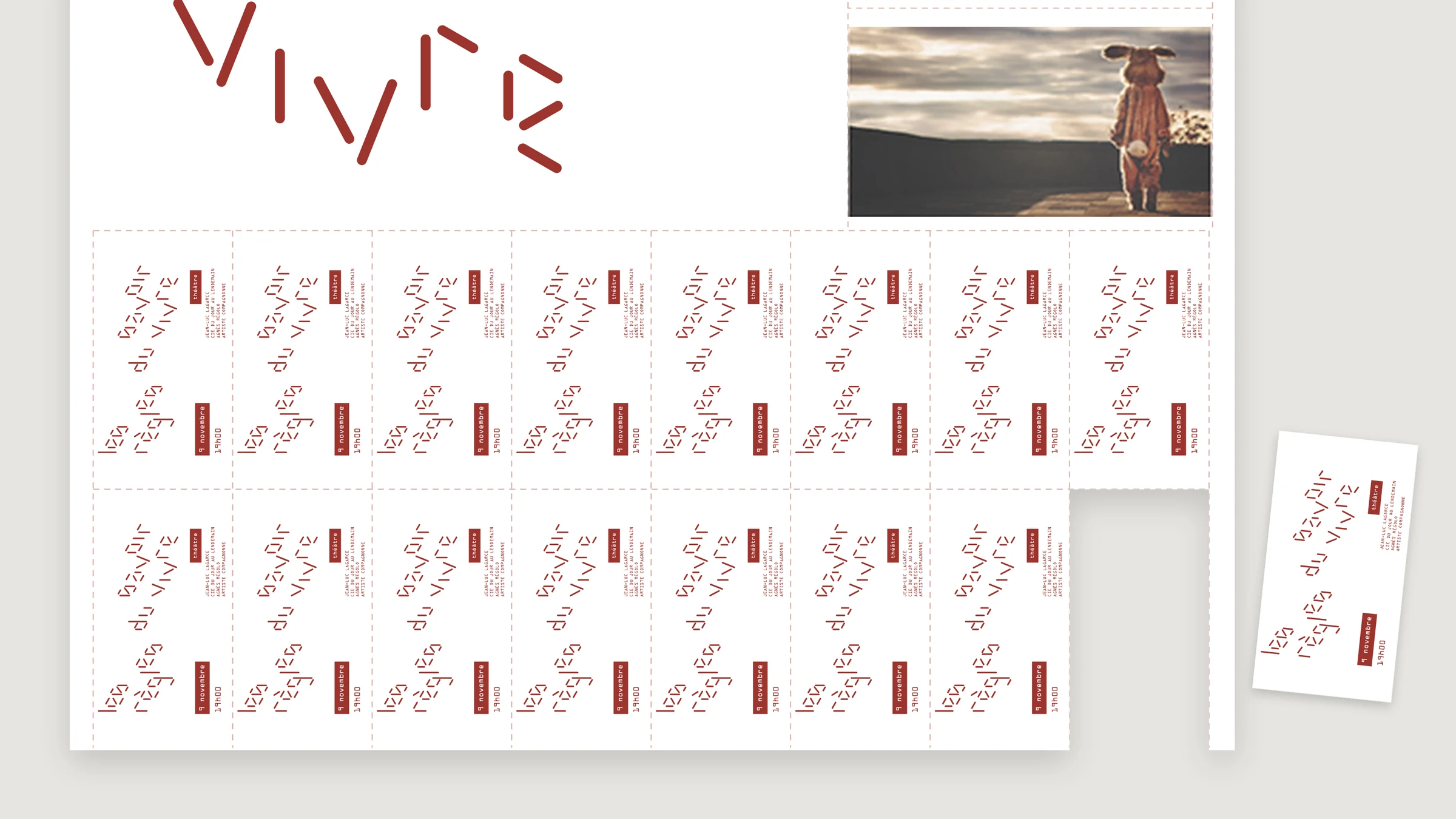 The foot of a poster with its rows of tickets; one ticket has been taken and lies beside it.